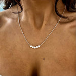 dainty silver chain necklace with 5 small pearls