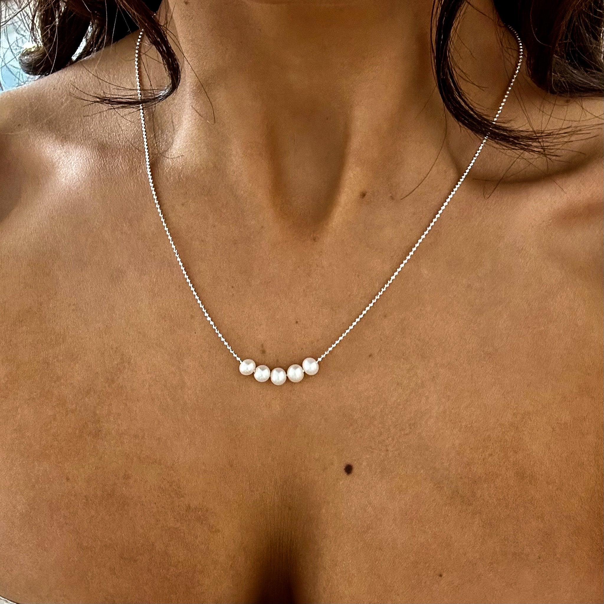 dainty silver chain necklace with 5 small pearls