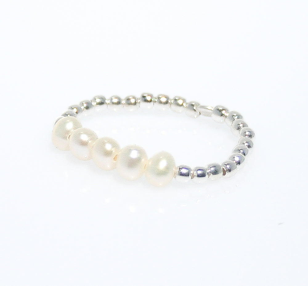 Elastic store pearl ring