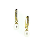 pearl earrings set in gold with cubic zirconias
