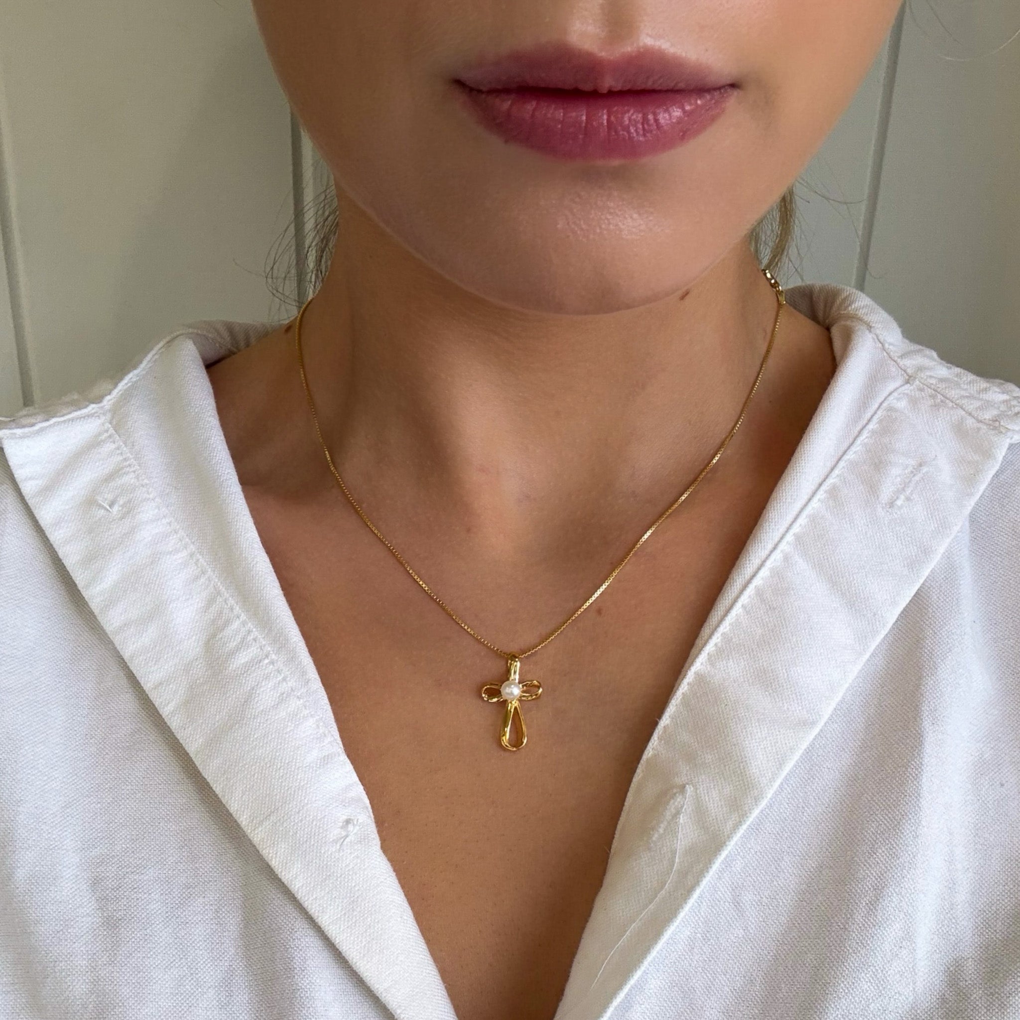 dainty cross pendant with pearl
