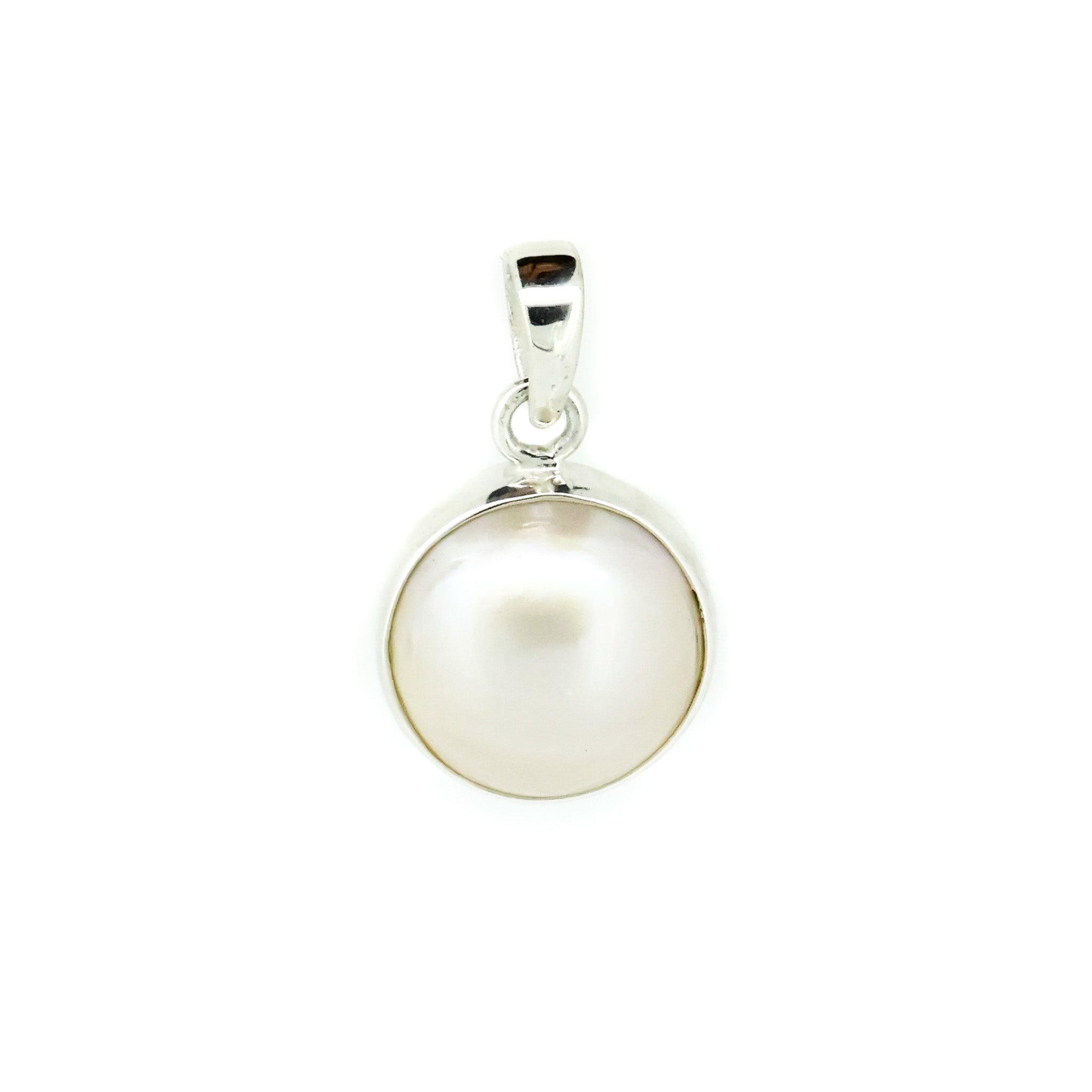 white mabe pearl pendant set in silver