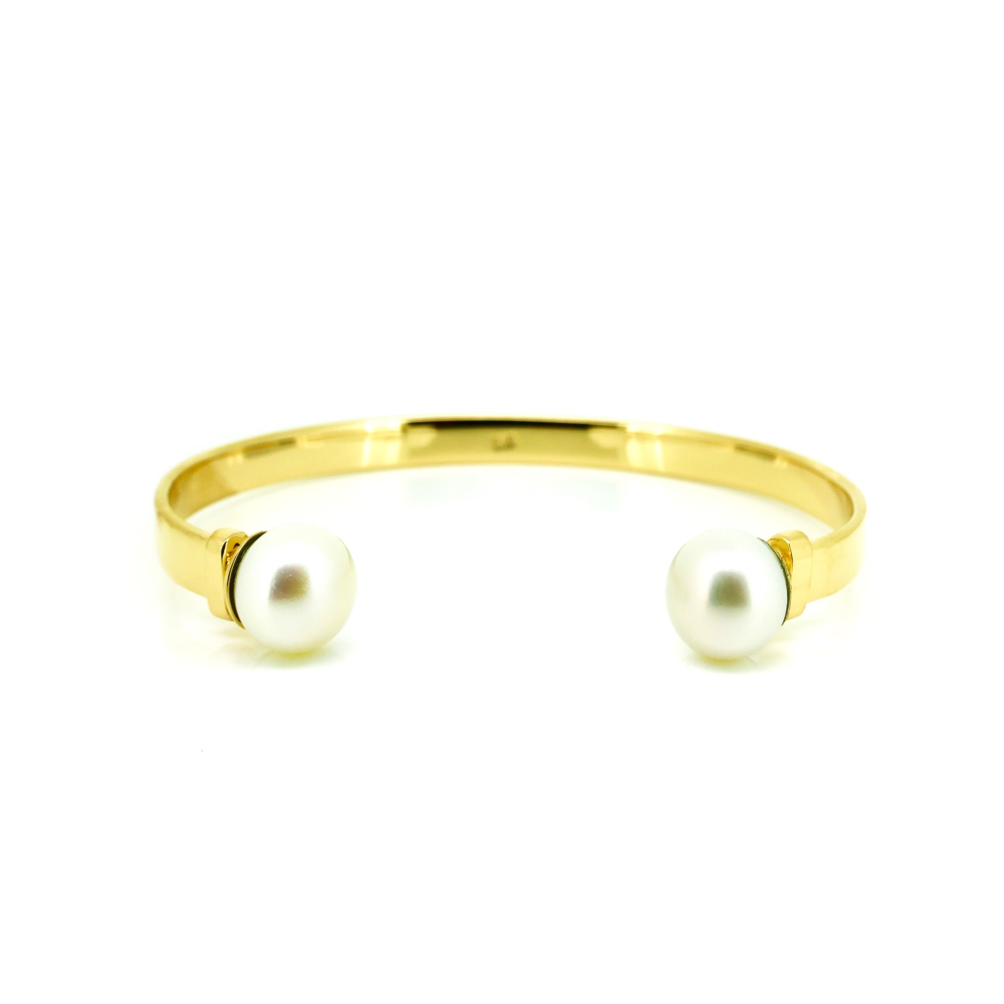 bold gold cuff with freshwater pearl detail