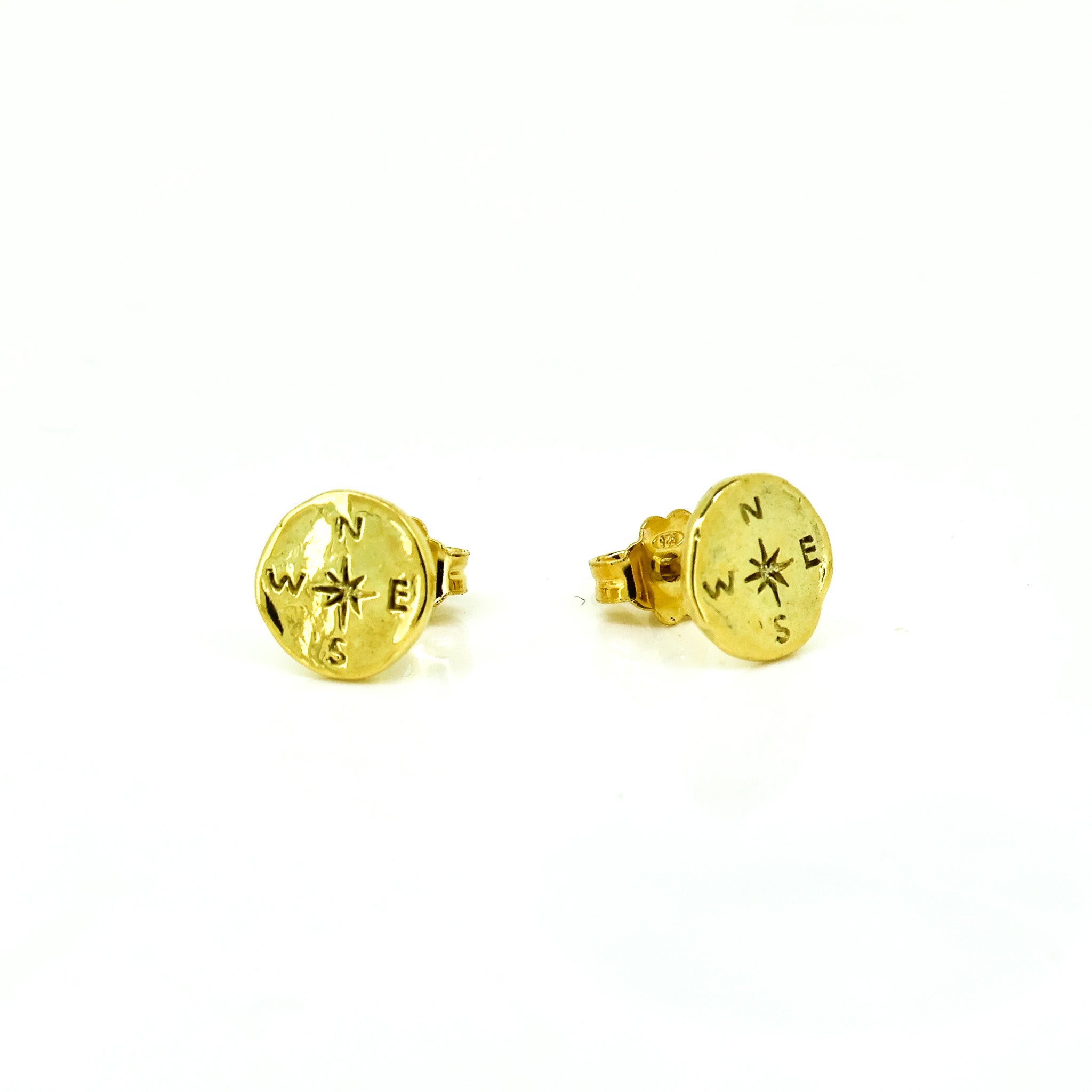 gold compass studs
