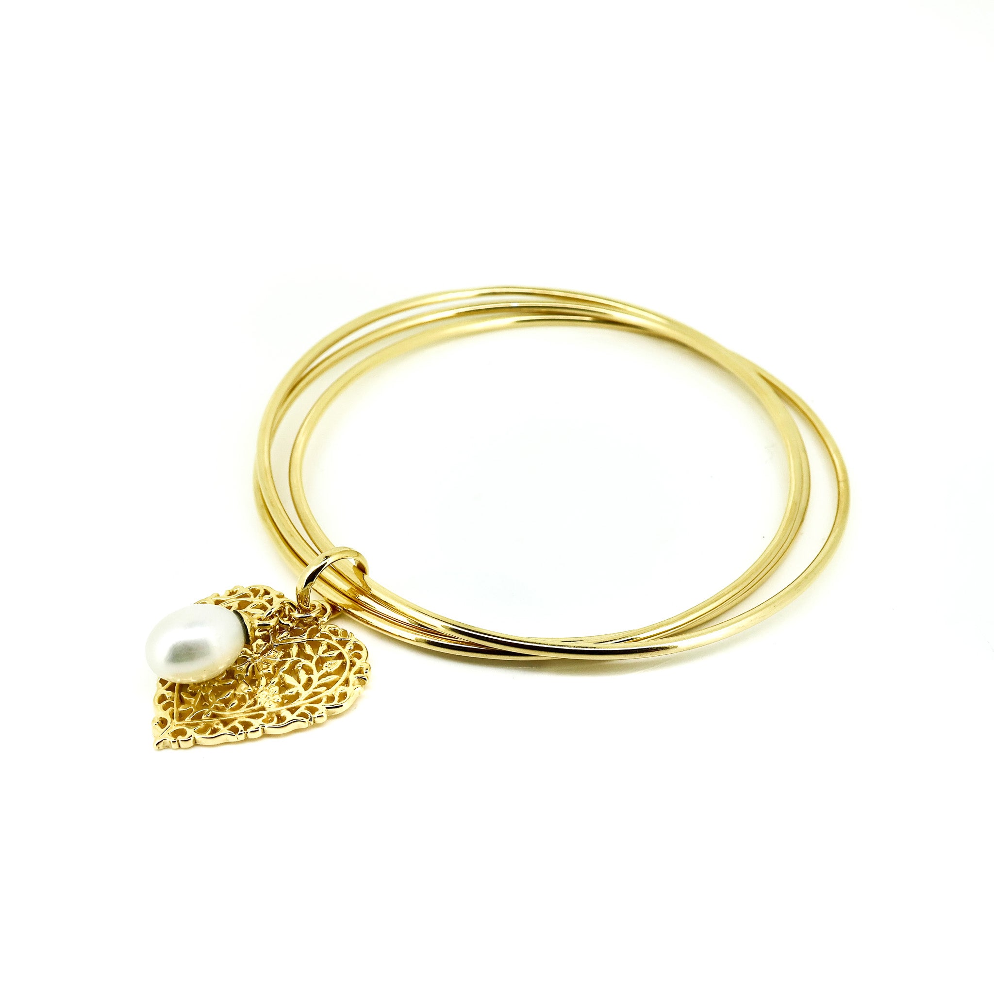 gold braclet with heart shaped charm