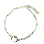silver bracelet with a cescent moon and pearl detail