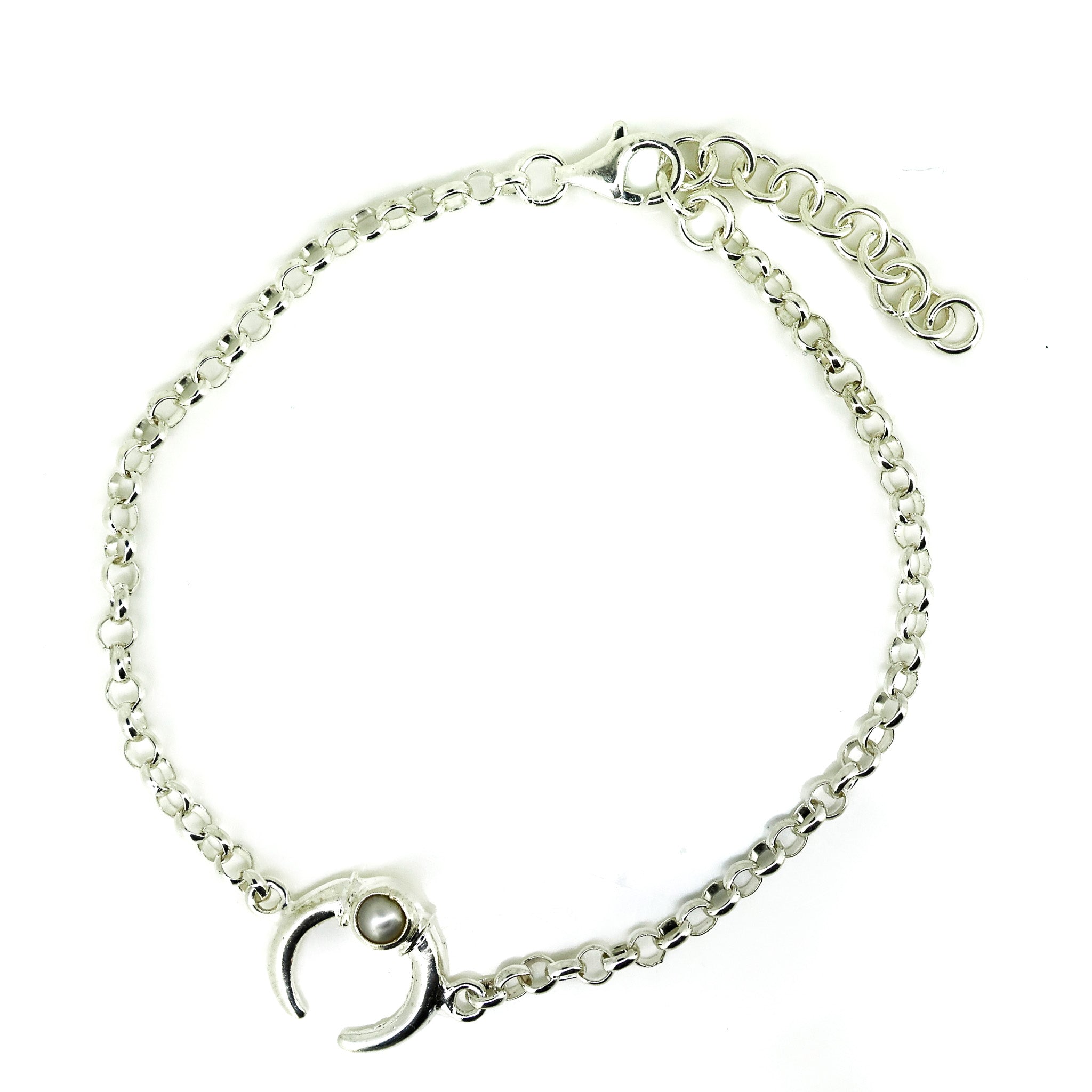 silver bracelet with a cescent moon and pearl detail