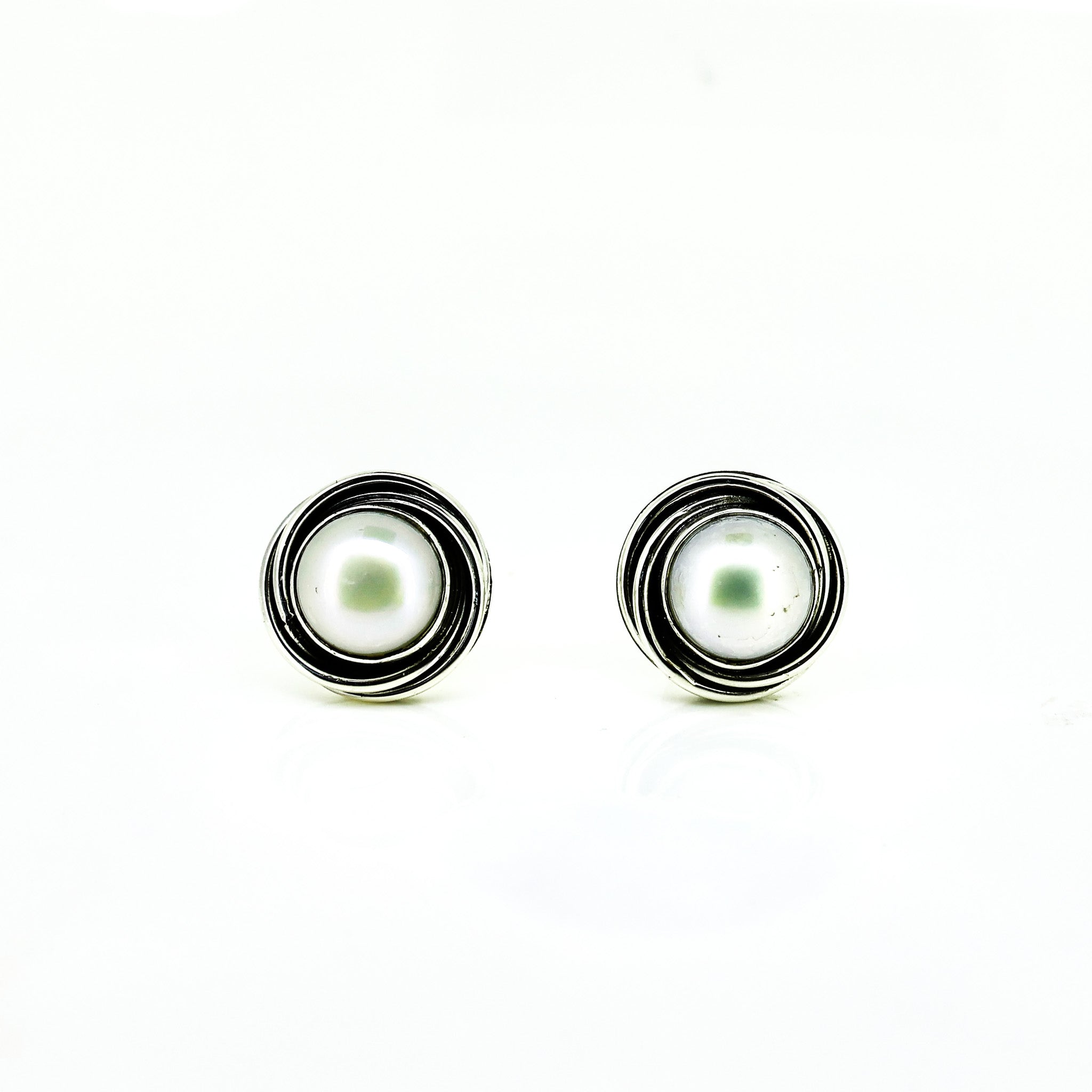 Gantheaume Sunset Studs – 9mm pearl earrings with sterling silver swirl design inspired by Broome sunsets