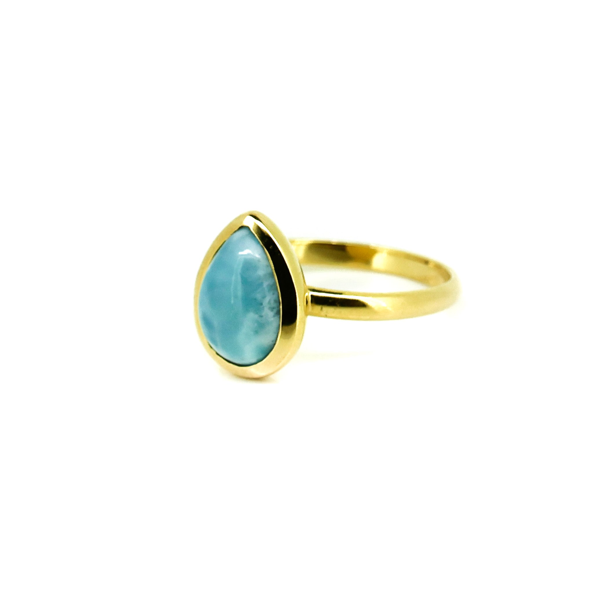 gold tear drop shaped larimar ring
