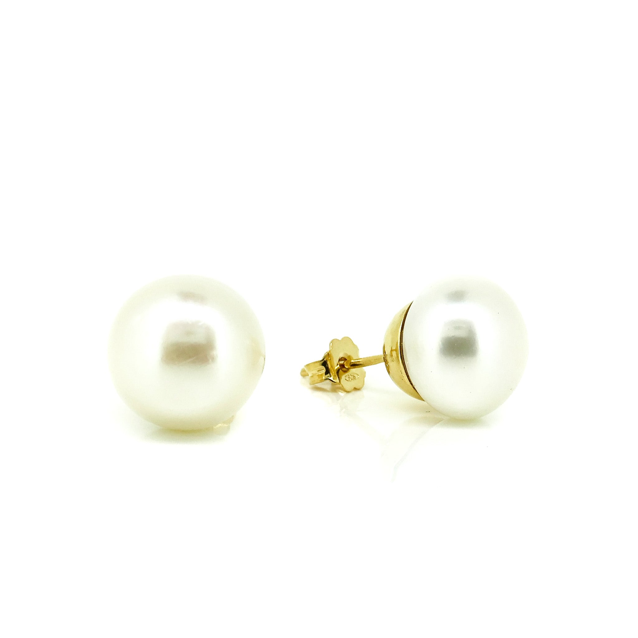 bold white kreshi pearl studs