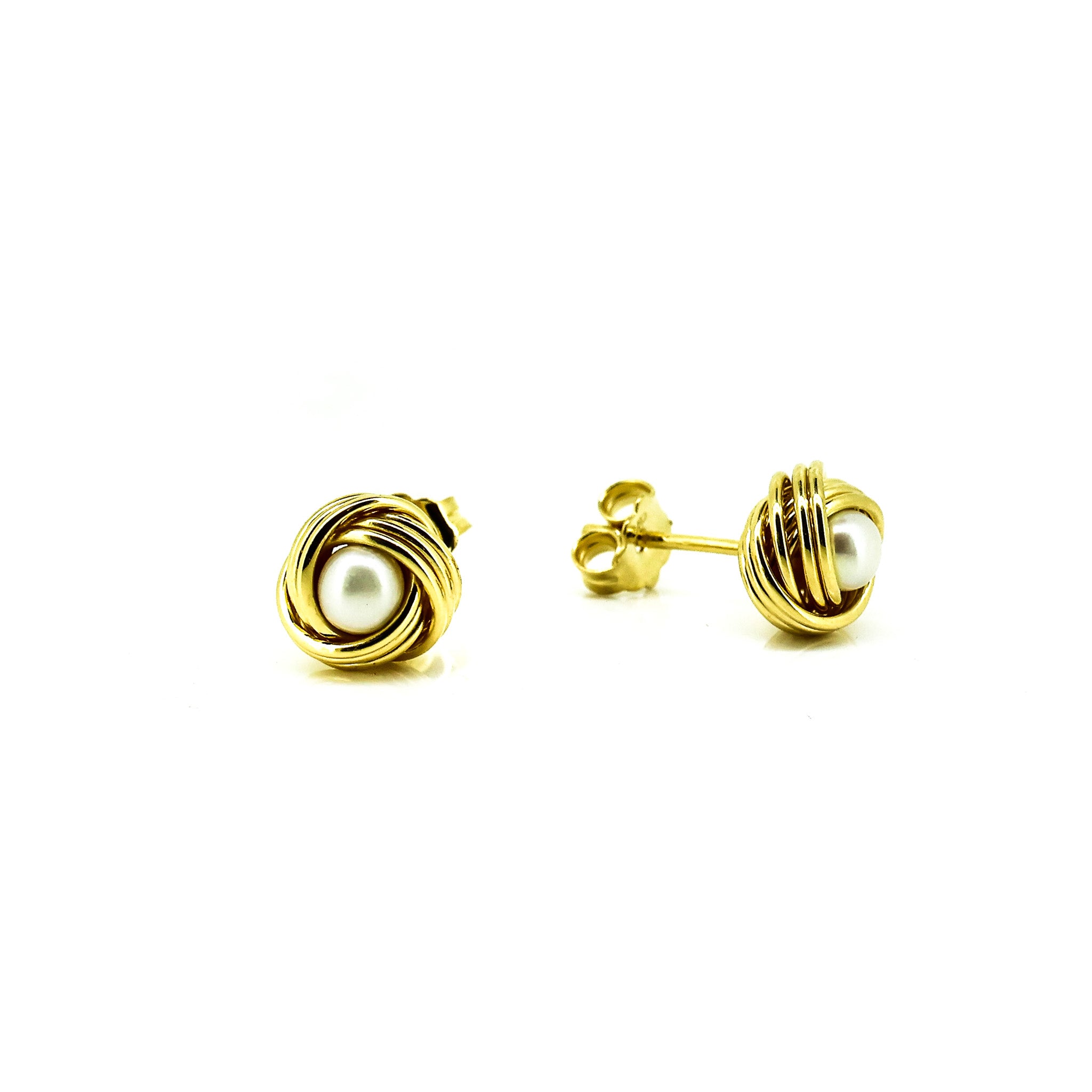 Gold pearl studs with twists around pearl