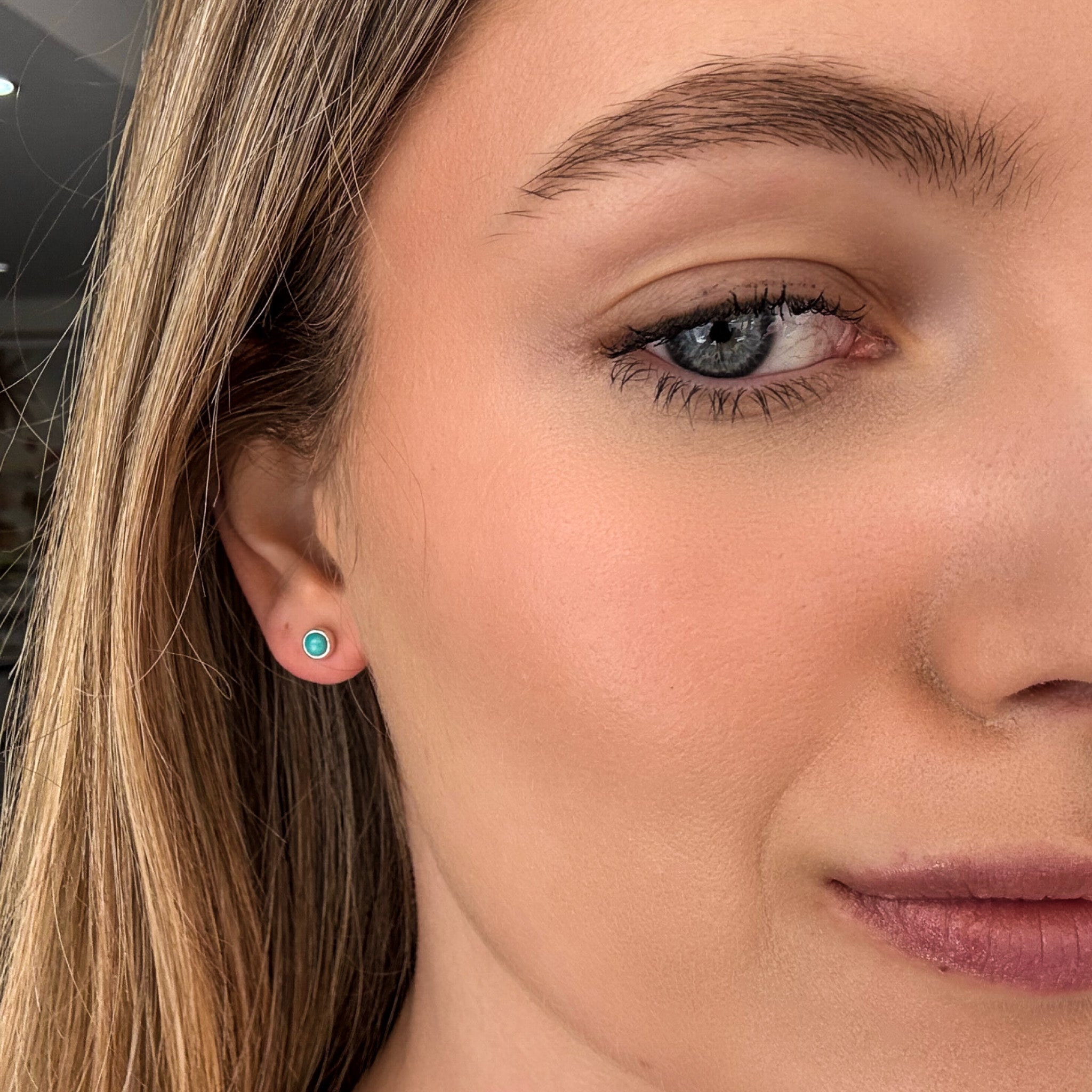 dainty larimar studs set in gold