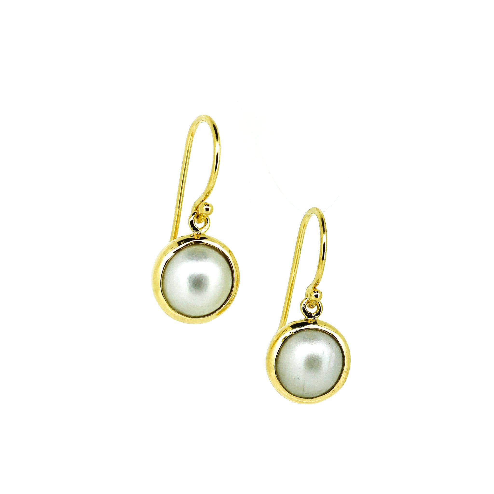 white mabe earrings set in gold