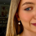 elegant pearl earrings in gold