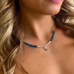 dainty necklace with gemstones and pearls