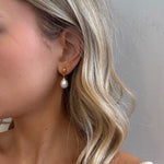 large pearl drop earrings in gold