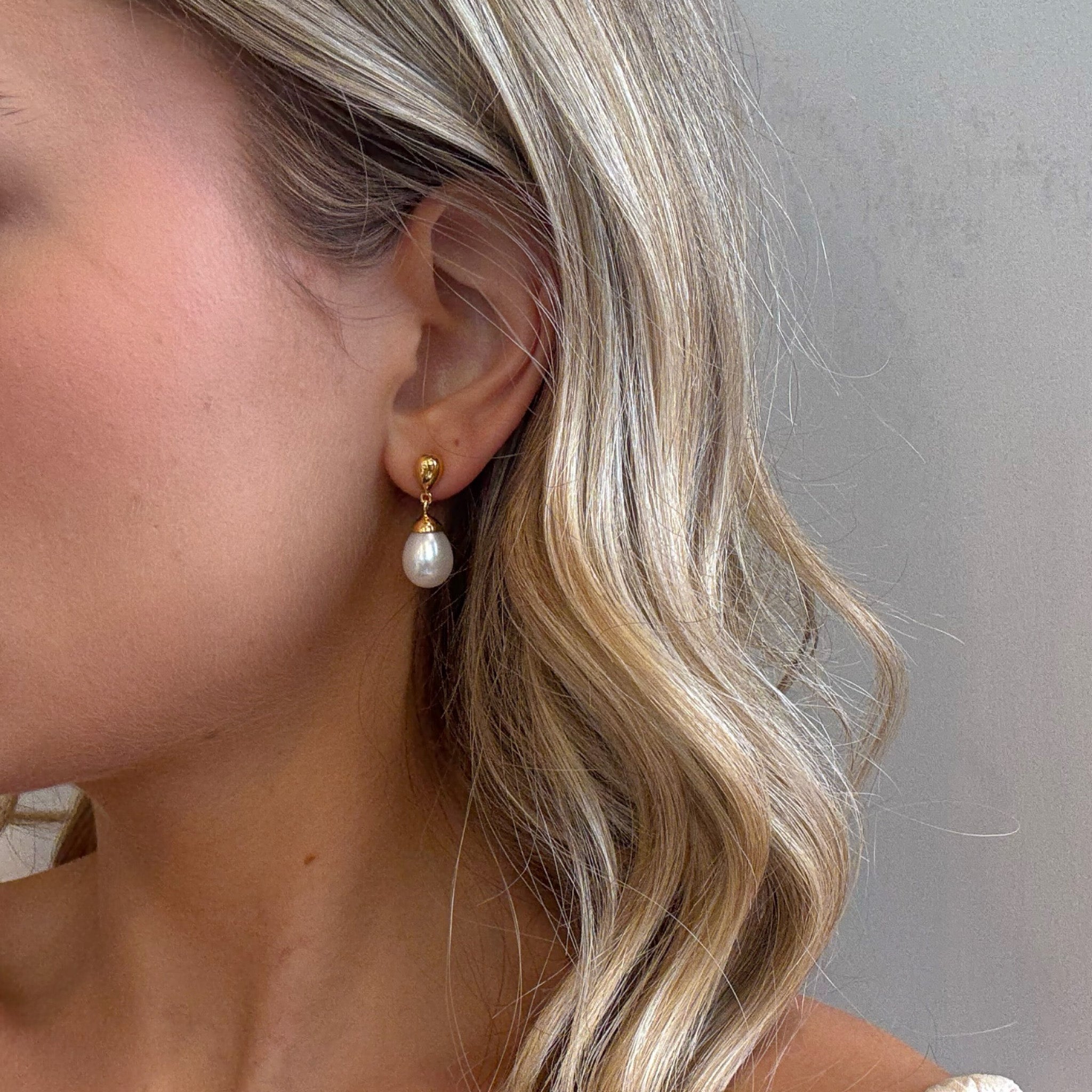 large pearl drop earrings in gold