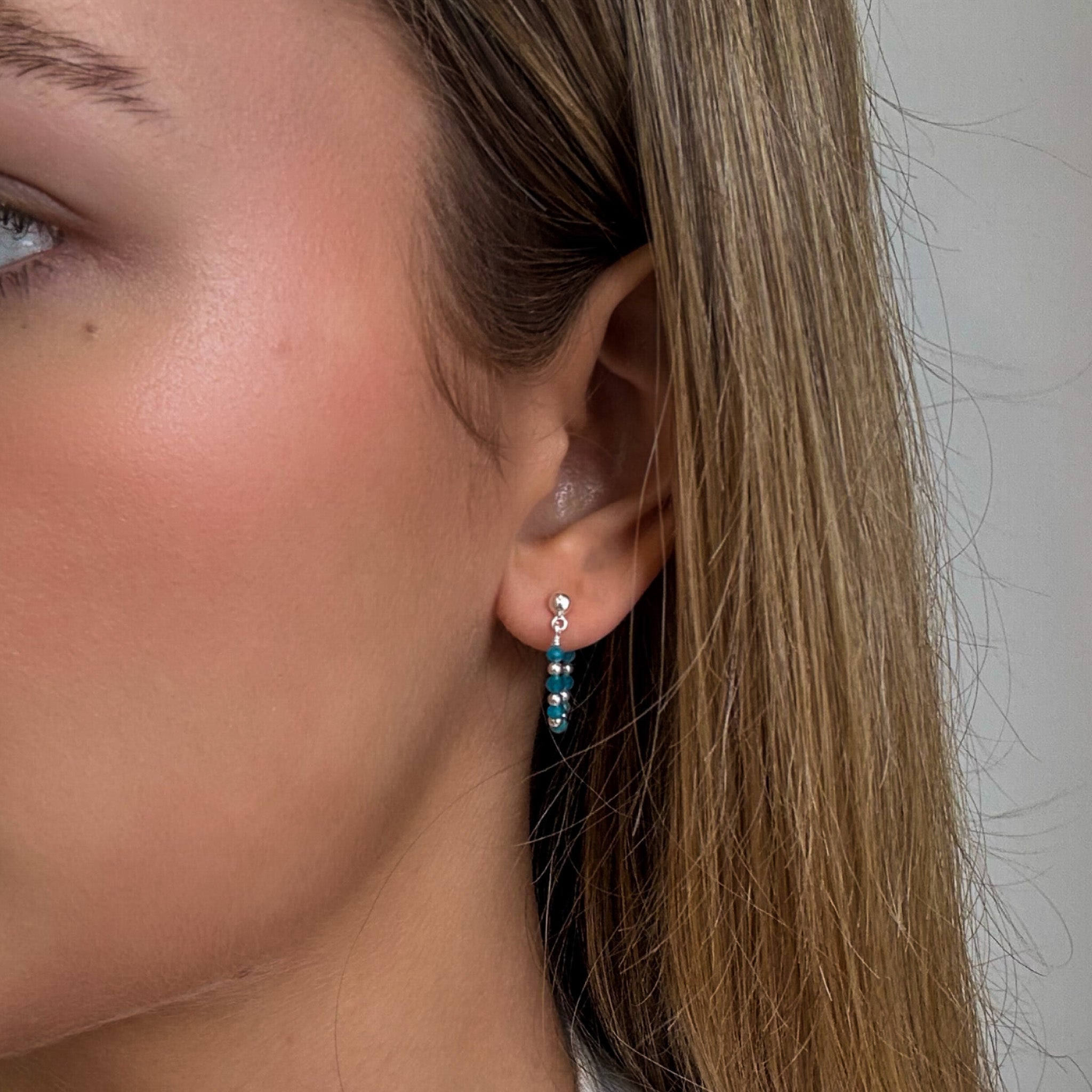 Oceanic Loops Apatite Earrings with sterling silver studs and blue gemstone beaded hoops