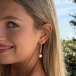 mabe pearl earrings set in gold
