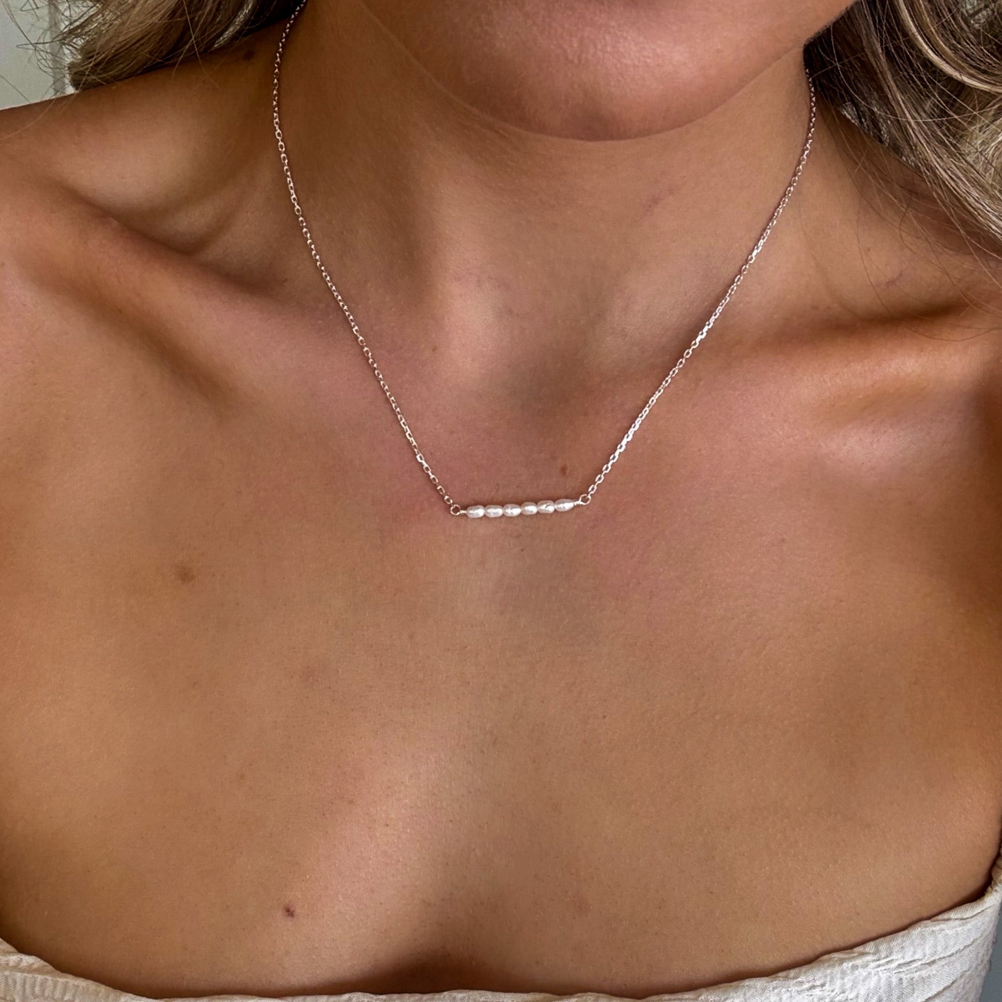 dainty silver chain necklace with dainty pearls