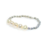 stretch sterling silver ring with pearls