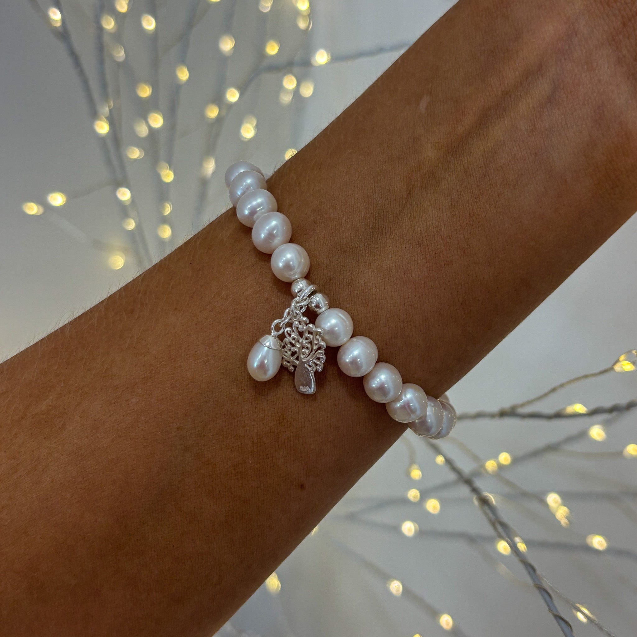 stretch pearl bracelet with boab charm