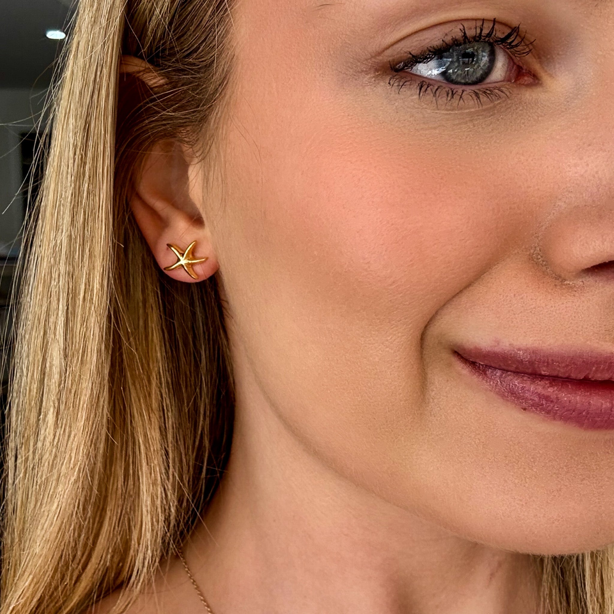 gold starfish studs
