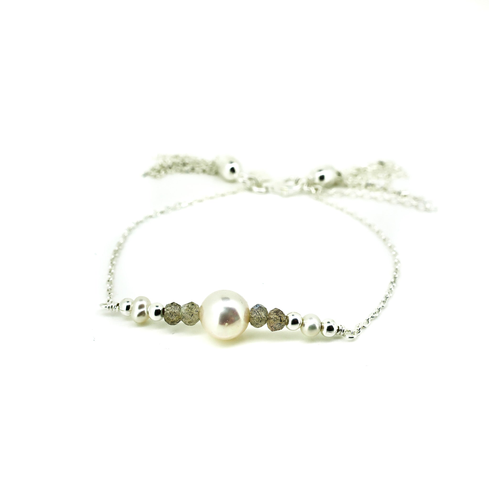 dainty pearl bracelet with pearl and gemstones in silver