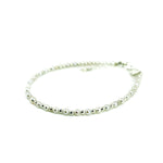 dainty neaded pearl and silver bracelet