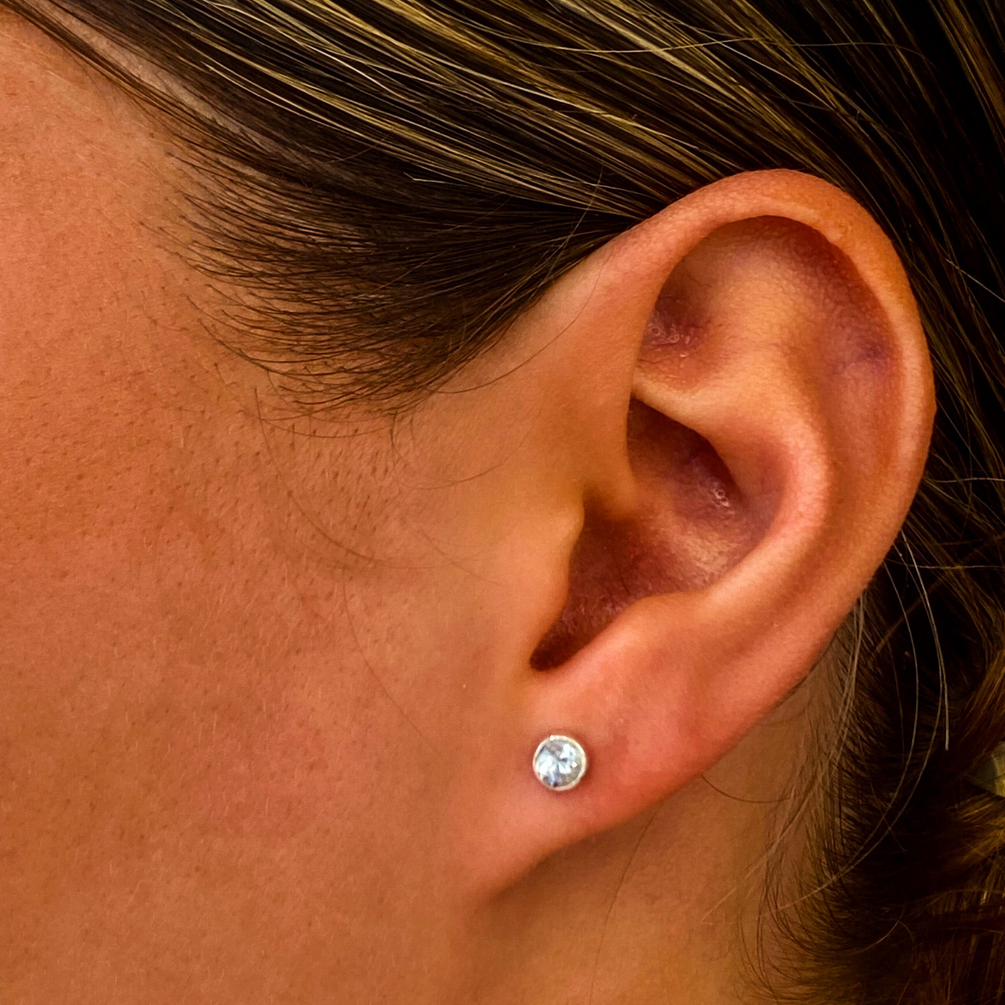dainty topaz studsin silver