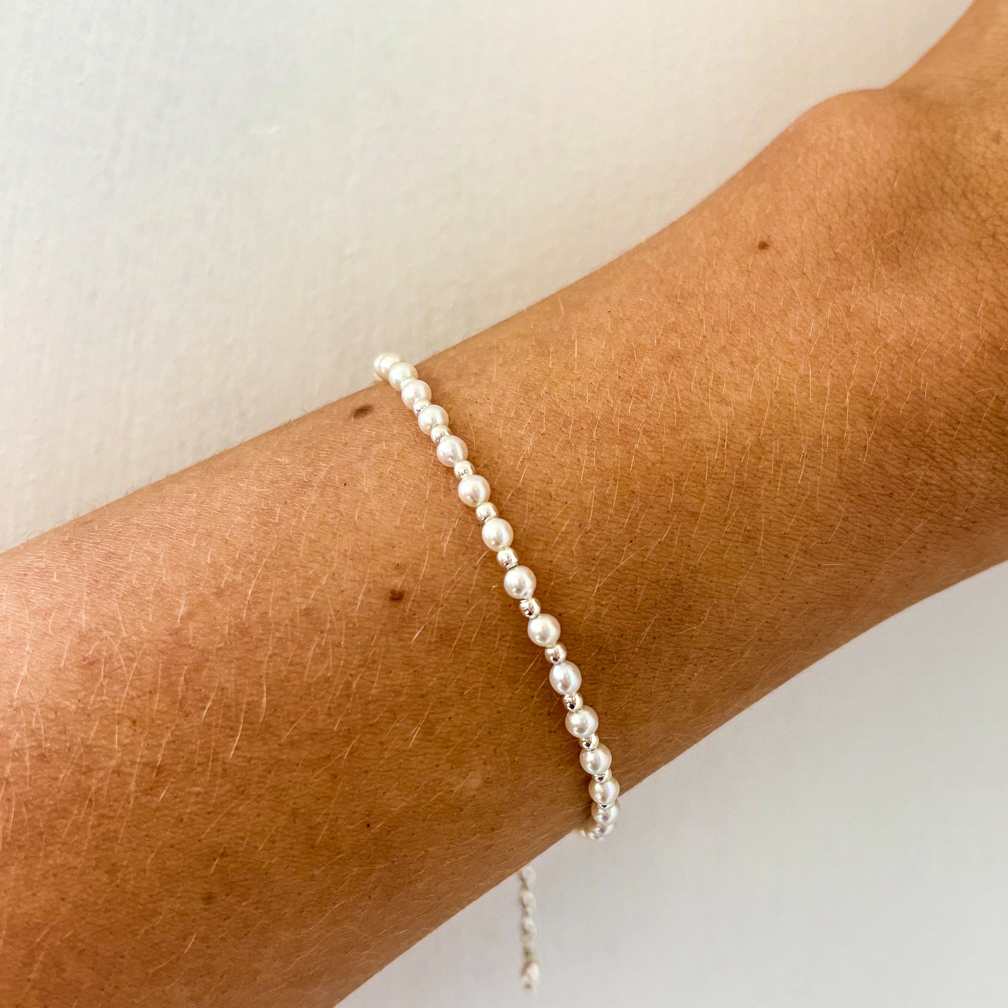 dainty pearl and silver bracelet