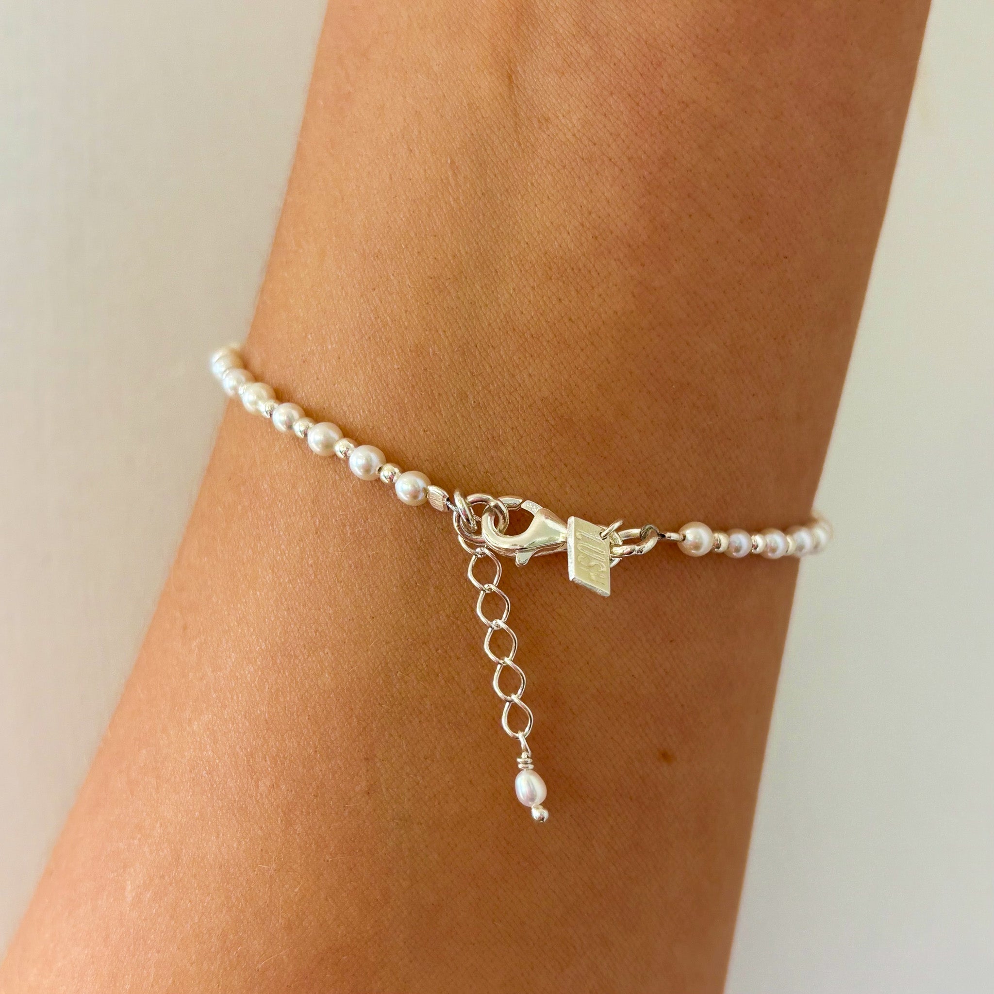 dainty beaded pearl and silver bracelet
