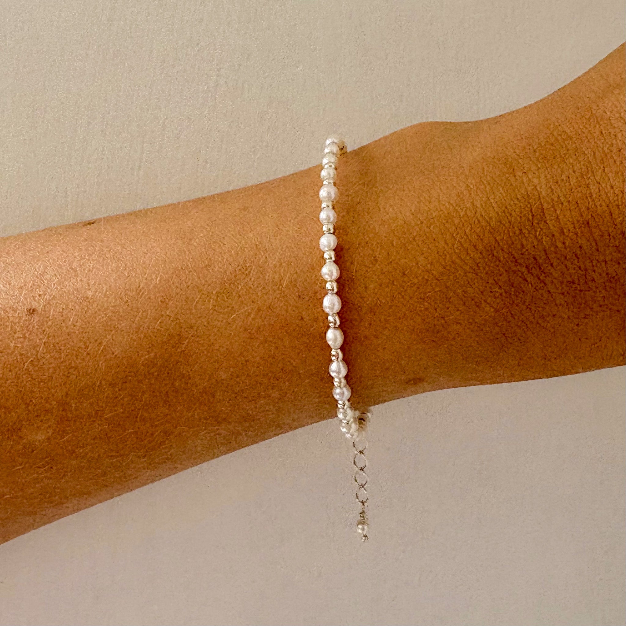 dainty pearl and silver ball bracelet