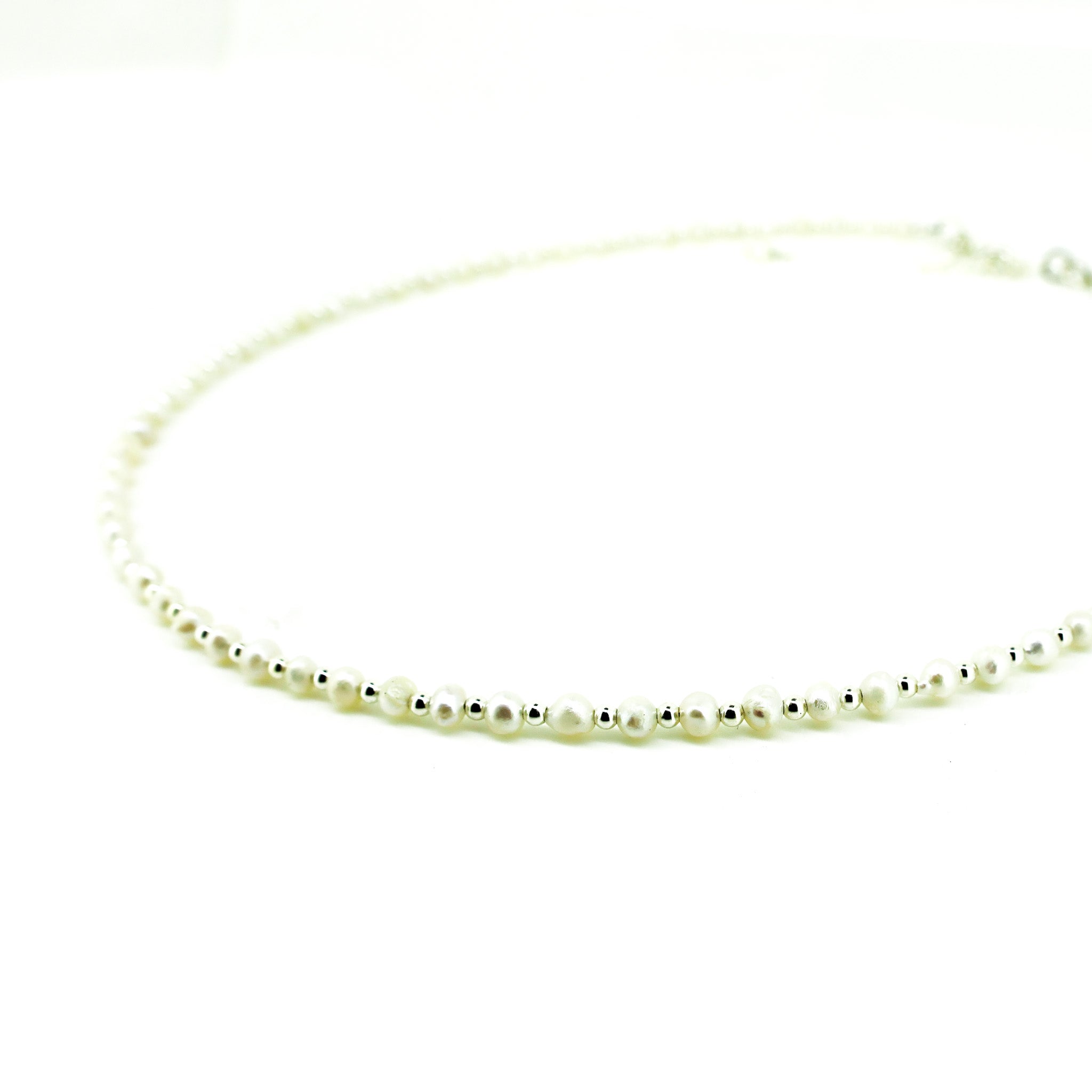 dainty pearl and silver necklace
