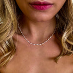 Dainty rice freshwater pearl on a sterling silver twist chain, minimalist coastal necklace.
