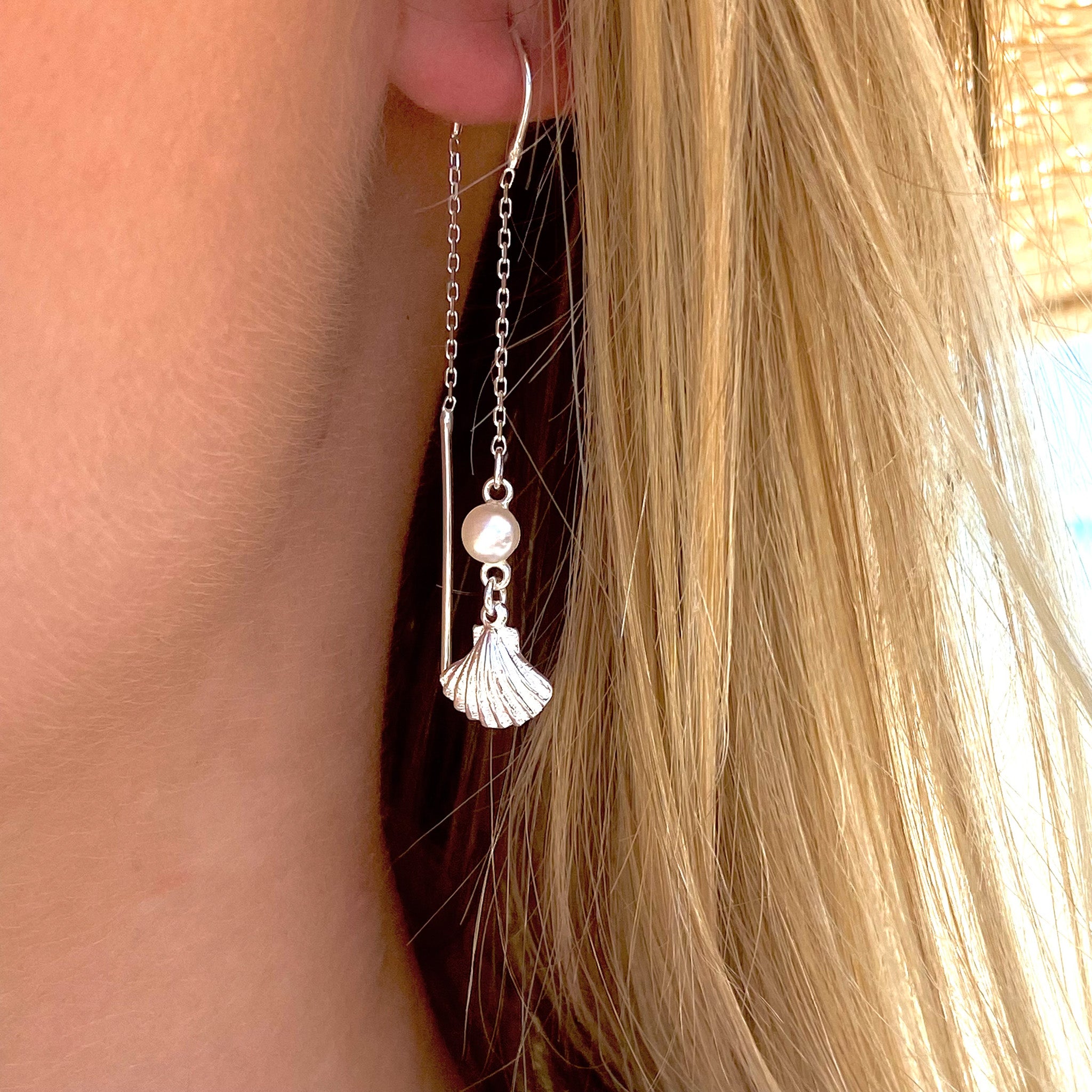 dainty silver shell thread earrings with pearl detail