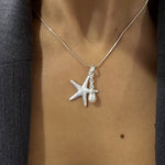 silver starfish pendant with pearl