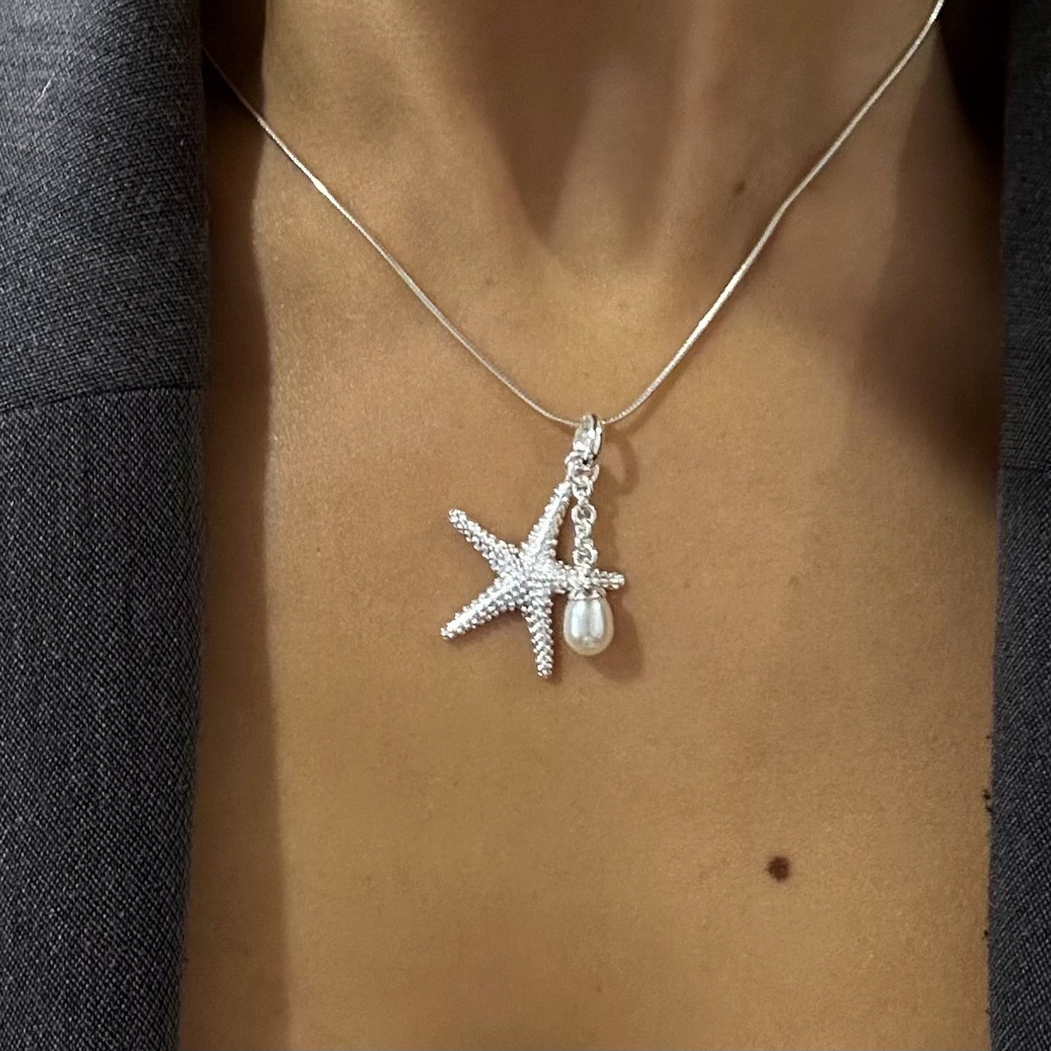 silver starfish pendant with pearl