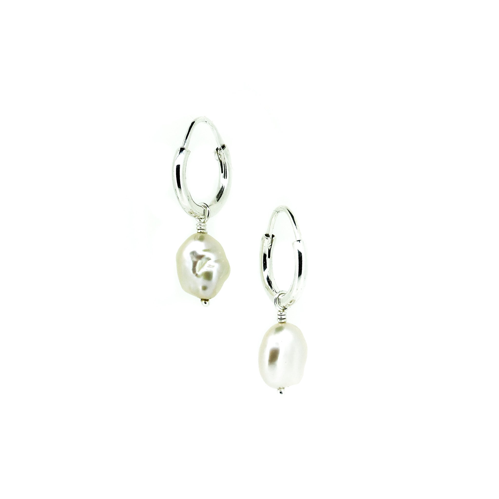 silver sleeper earrings with white freshwater keshi pearls