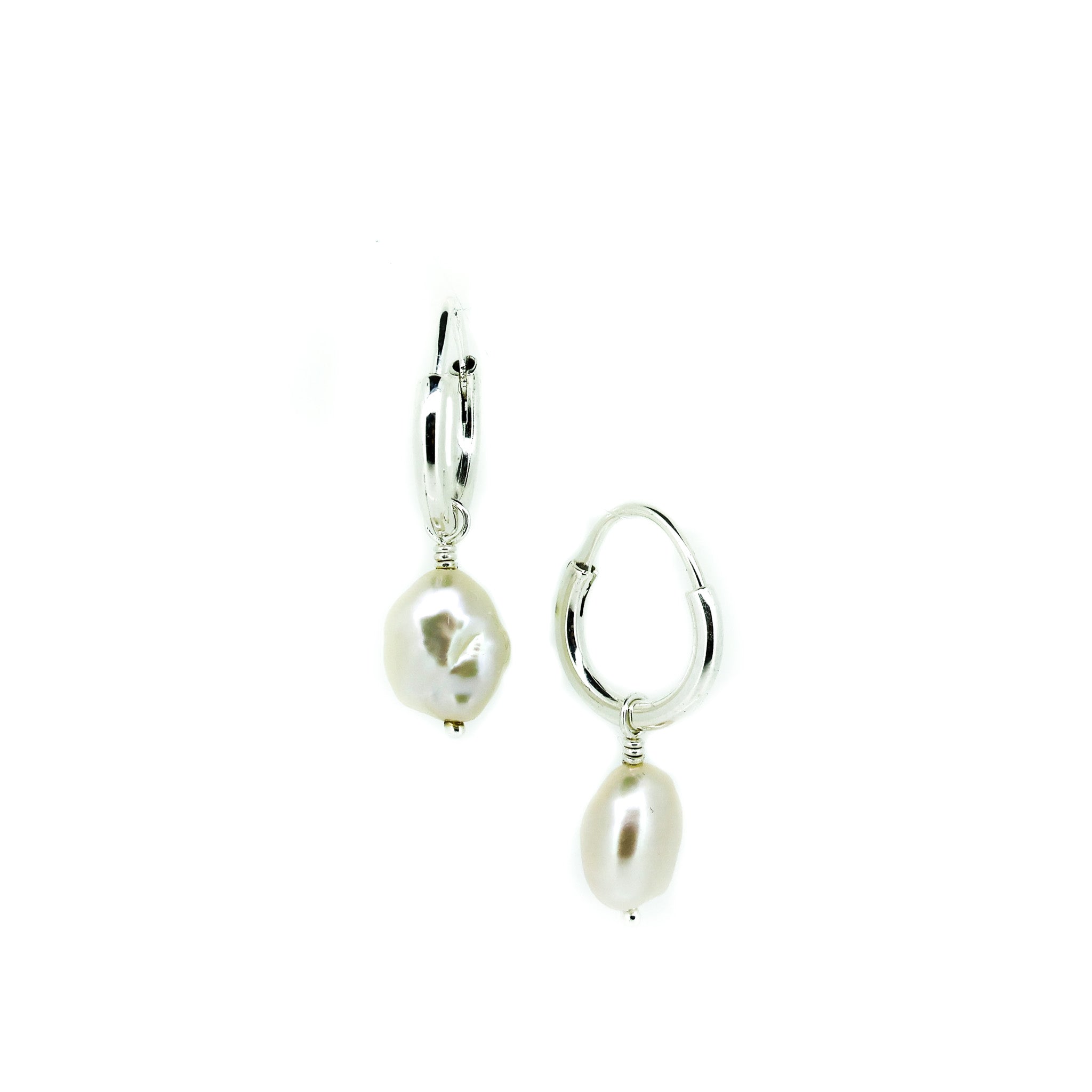 silver sleeper earrings with white freshwater keshi pearls