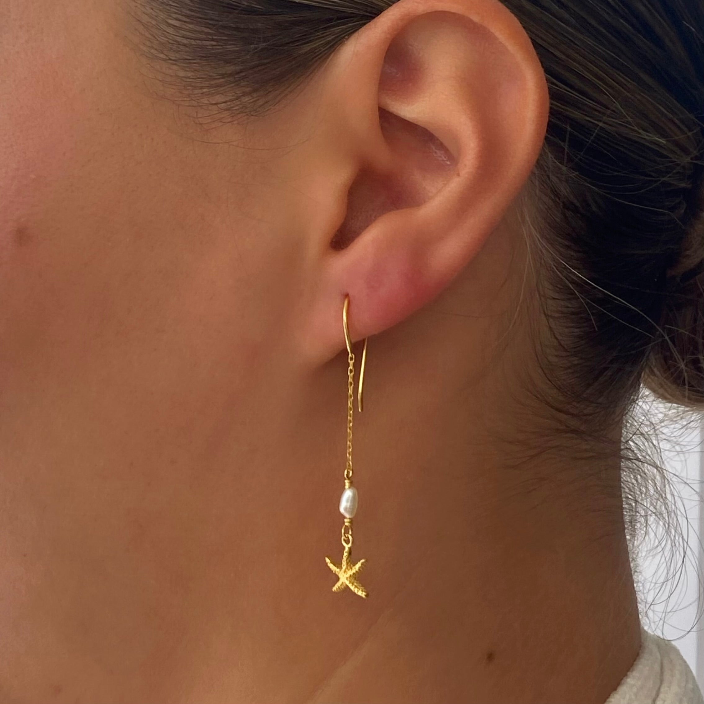 sunlit starfish earrings gold
