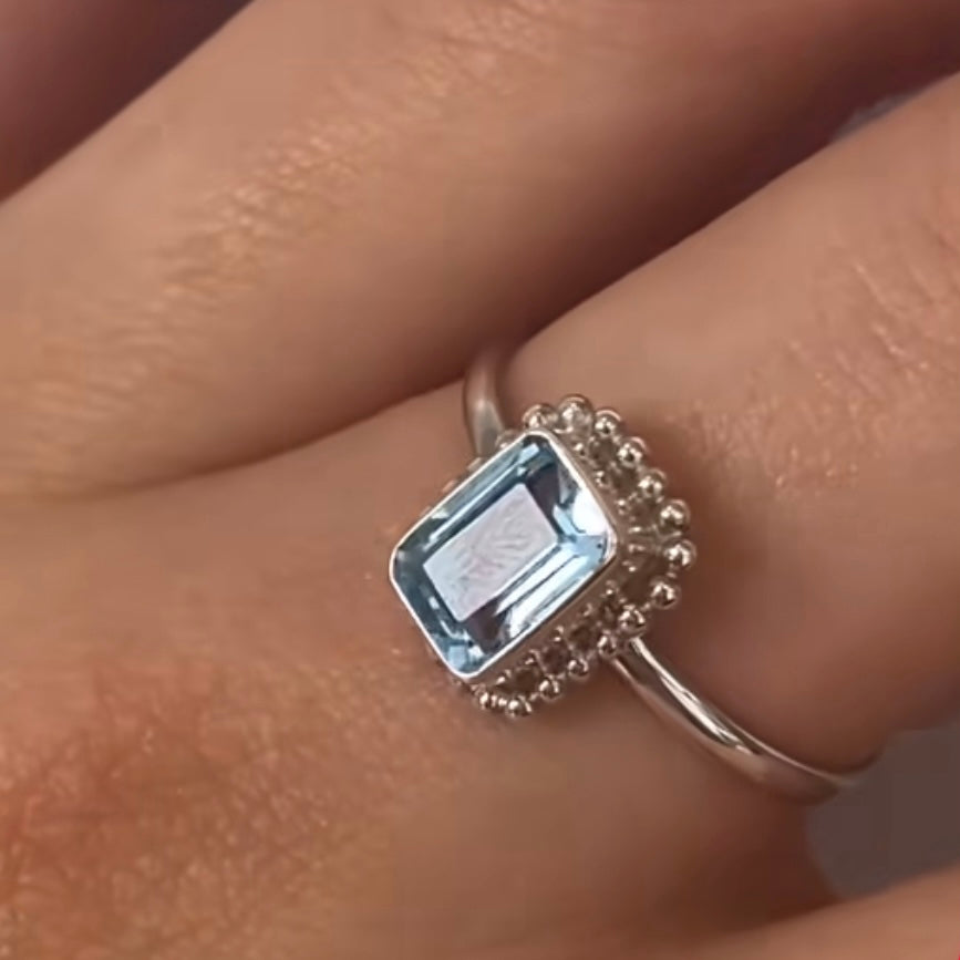 silver topaz ring