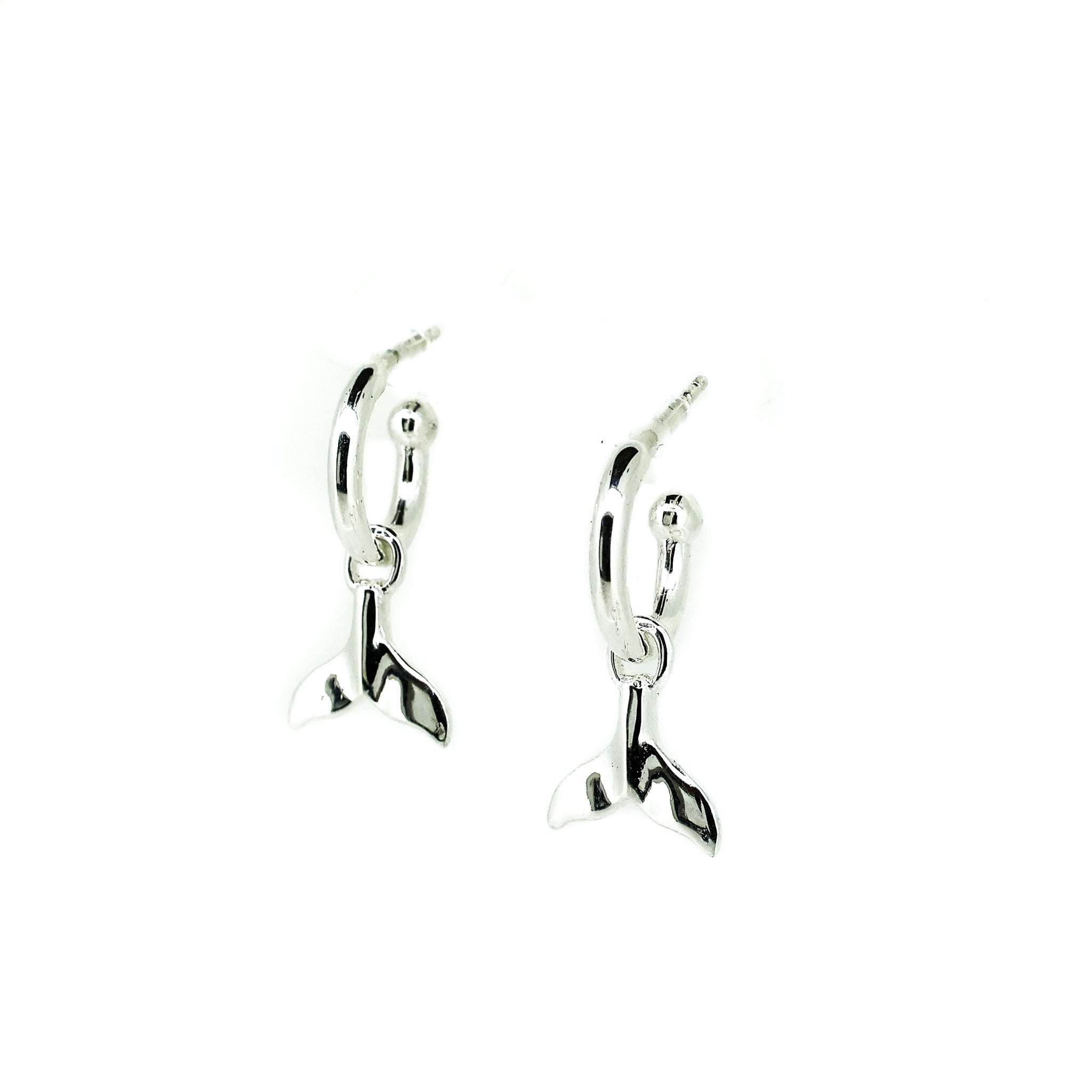 silver hoop earrings with whale tail charm