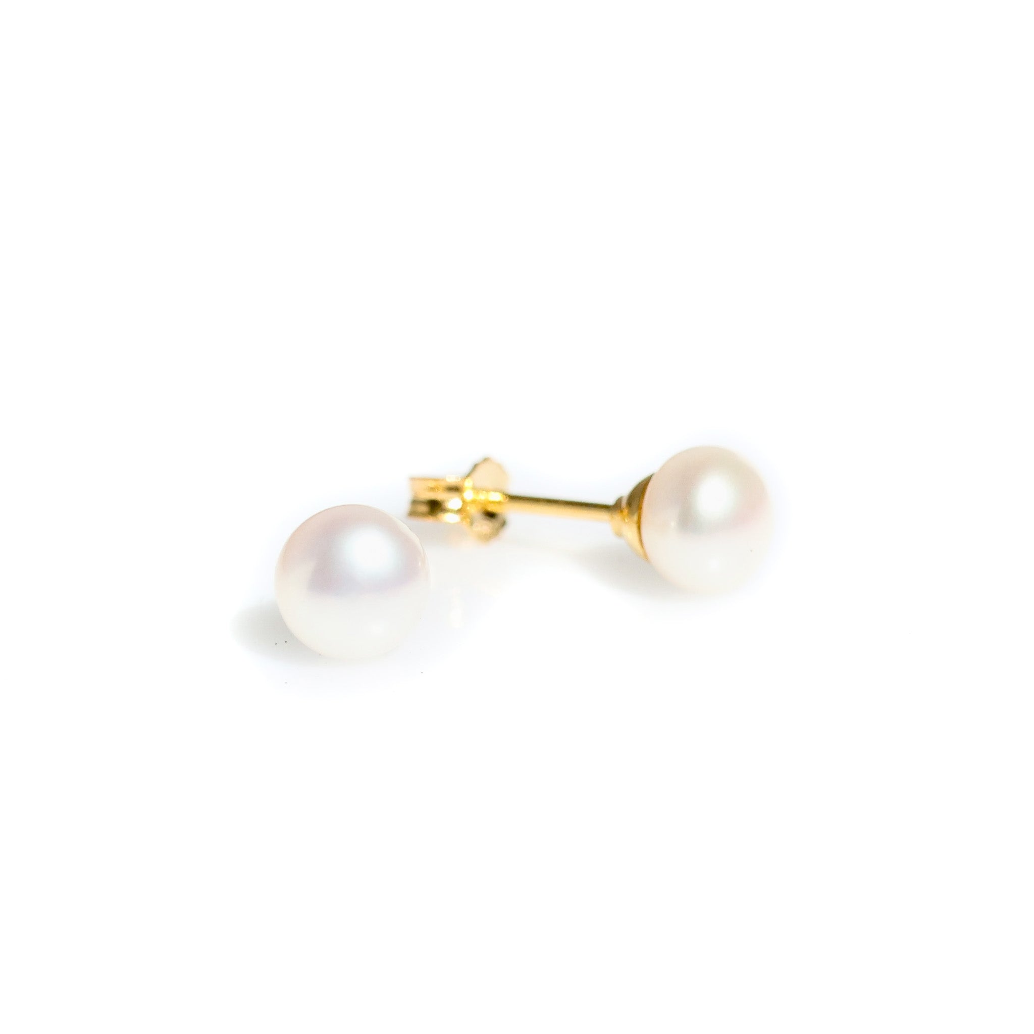 6mm dainty white pearl studs set in gold
