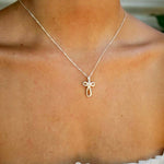 pearl cross pendant