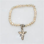 PEARL STRETCH BRACELET WITH STERLING SILVER GUARDIAN ANGEL CHARM
