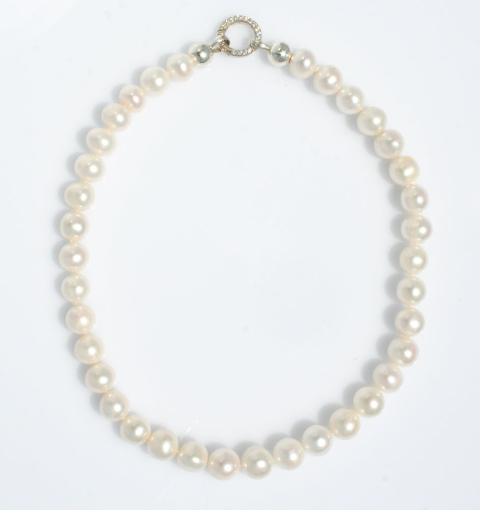PEARL NECKLACE INDIVIDUALLY HAND KNOTTED ON SILK WITH STERLING SILVER CLASP