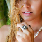 black pearl ring set in silver