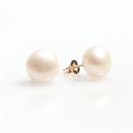 pearl studs in gold