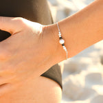 dainty silver chain bracelet with pearls and black agate